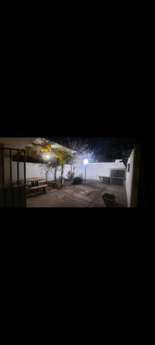 a view of a parking lot at night at Mi Hogar in Ciudad Lujan de Cuyo