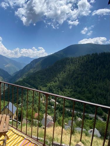 a view of the mountains from a balcony at Un coin merveilleux du Mercantour in Roubion
