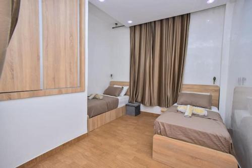 Ένα ή περισσότερα κρεβάτια σε δωμάτιο στο Appartement Authentique & Moderne au Cœur de la Médina