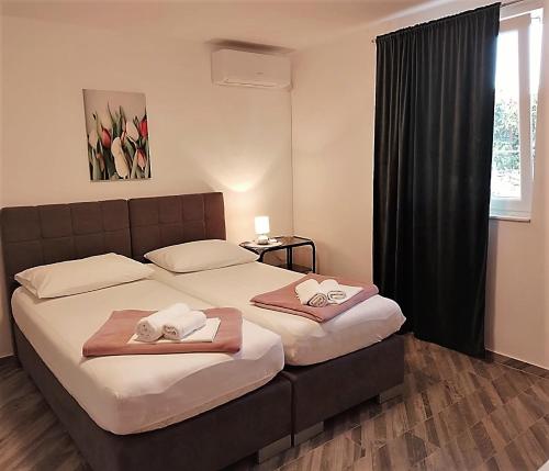Ένα ή περισσότερα κρεβάτια σε δωμάτιο στο Zorin House Rooms