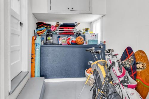 a bike parked in a room with skateboards at Great Hammock Getaway in Old Saybrook