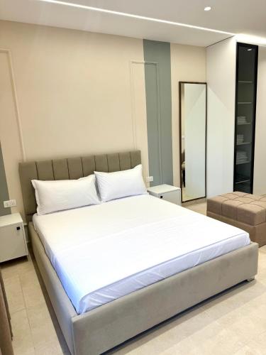 Katil atau katil-katil dalam bilik di White Arena Apartments GOLEM