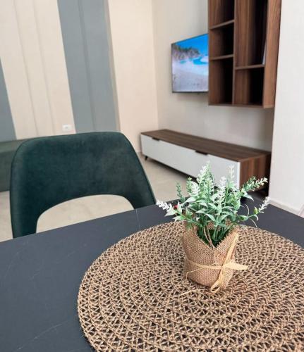 Televisyen dan/atau pusat hiburan di White Arena Apartments GOLEM