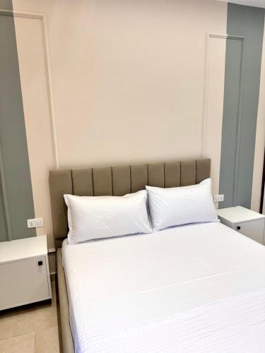 Katil atau katil-katil dalam bilik di White Arena Apartments GOLEM