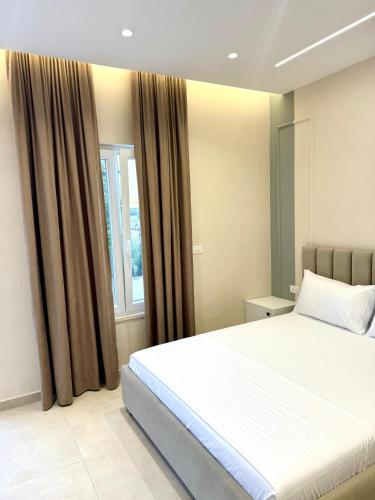 Katil atau katil-katil dalam bilik di White Arena Apartments GOLEM