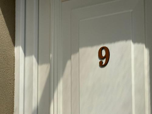 a door with the number on it at Joanna's apartments in Virós