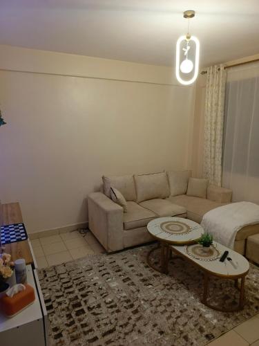 Χώρος καθιστικού στο Secure 1 bedroom juja