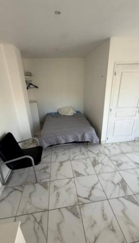 Postel nebo postele na pokoji v ubytování studio dans villa