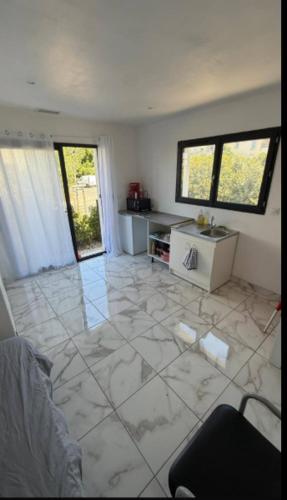 Posezení v ubytování studio dans villa