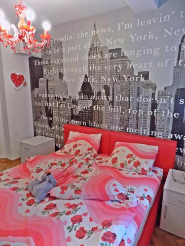 Una cama o camas en una habitación de Apartment Kragujevac