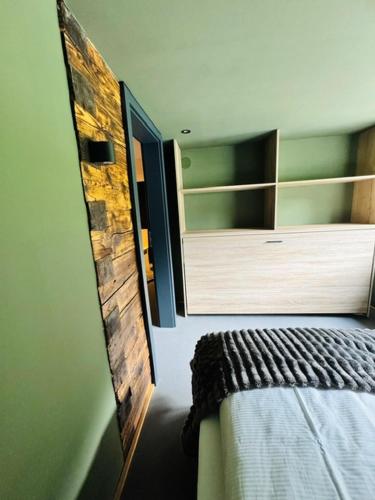 Cama o camas de una habitación en KWT Lodge