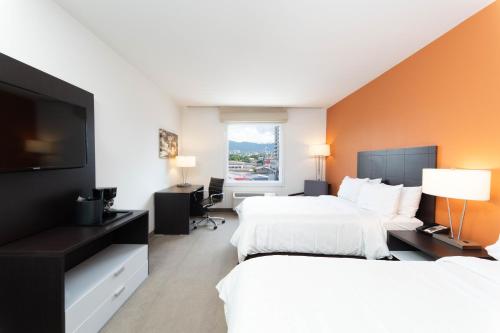 TV a/nebo společenská místnost v ubytování Holiday Inn Express Tegucigalpa by IHG