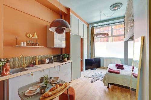 Cuina o zona de cuina de Cozy studio - fully equipped