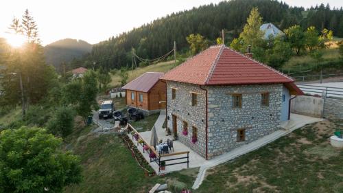 an aerial view of a house with a red roof at Kula 1960 Stone House in Rožaje