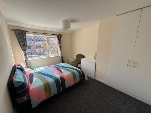 The Stayover Spot Wigston Escapeにあるベッド