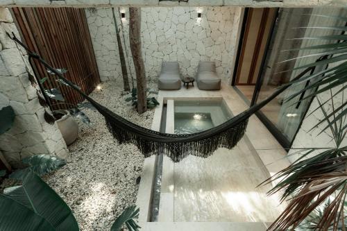 an overhead view of a bathroom with four toilets at Ka'ana Condo in Tulum