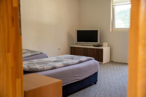 Postel nebo postele na pokoji v ubytování Kuća Bijela - Konjic