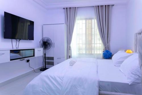 Una cama o camas en una habitación de Studio Apartment Ikeja GRA Lagos