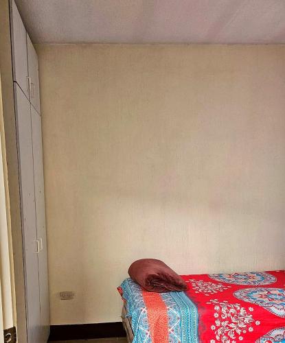 Postel nebo postele na pokoji v ubytování Hostal León