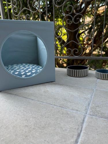 a chair sitting on a patio next to a fence at Belvedere MareMonti in Belvedere Ostrense