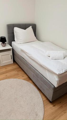Ένα ή περισσότερα κρεβάτια σε δωμάτιο στο Apartment Andi Parndorf