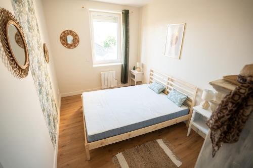 Katil atau katil-katil dalam bilik di L'Escale Caennaise House for 8 people