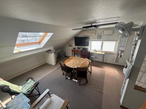Guest House モモにあるテレビまたはエンターテインメントセンター