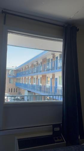 a view of a large building from a window at Empress Inn and Suites by the Falls in Niagara Falls