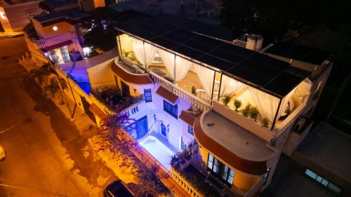 an overhead view of a house with a solar roof at Casa Bien Estar - Centro Merida in Mérida