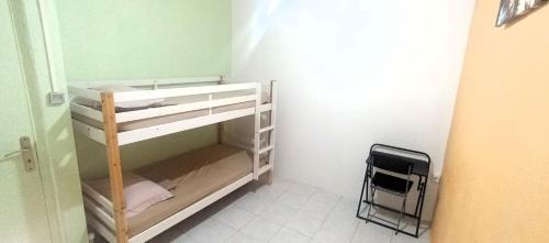 Postel nebo postele na pokoji v ubytování Hostel des 3 sources