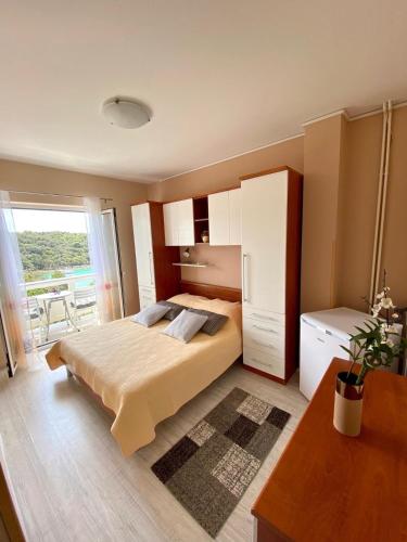 Apartments and rooms by the sea Gozinka, Rab - 24767