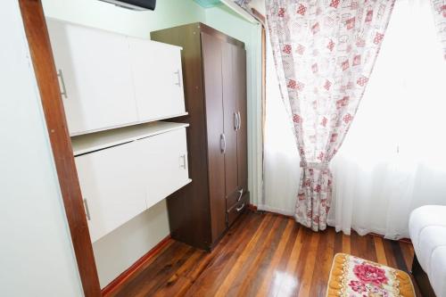 Ένα ή περισσότερα κρεβάτια σε δωμάτιο στο Hostal Mi Maravilla