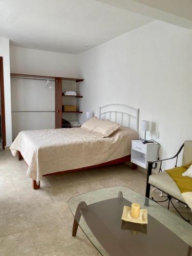 Ένα ή περισσότερα κρεβάτια σε δωμάτιο στο La Noria Apartment