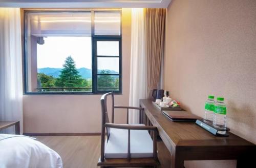 Xinwei Hotelにあるベッド