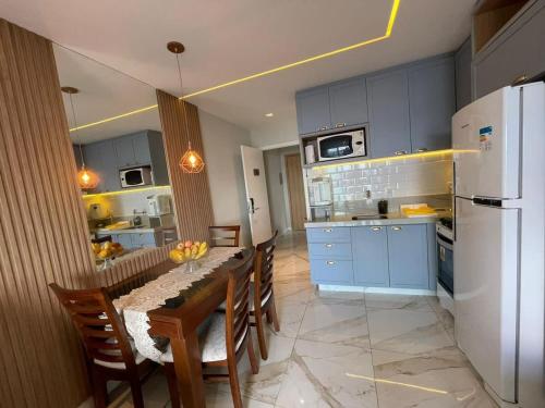 Kuchyň nebo kuchyňský kout v ubytování Apto Vista Frontal Mar de Camburi