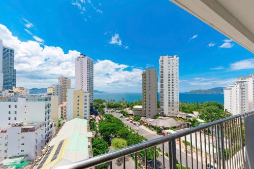 a view of a city from a balcony at D26 Nha Trang Hotel in Nha Trang