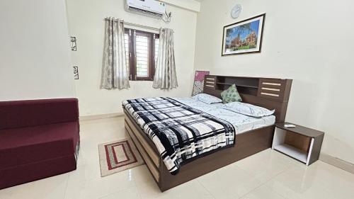 Postel nebo postele na pokoji v ubytování Samadhan Home Stay