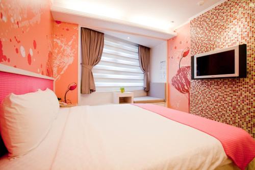 TV a/nebo společenská místnost v ubytování 墾丁合歡8宿-Ho Huan B & B