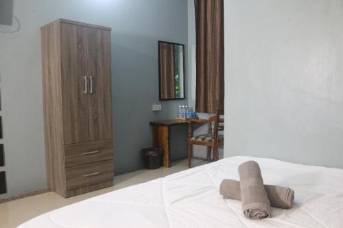 Postel nebo postele na pokoji v ubytování Nara Inn Langkawi