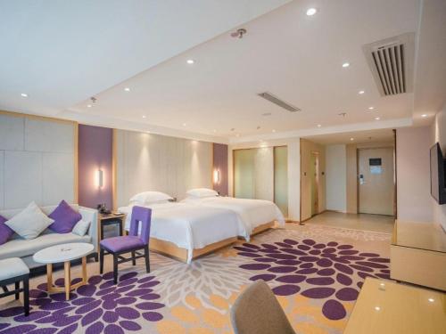 Postel nebo postele na pokoji v ubytování Lavande Hotel Hengyang Nayue Hengshan Scenic Area