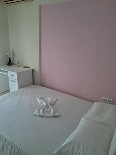 Ένα ή περισσότερα κρεβάτια σε δωμάτιο στο Xara apartment