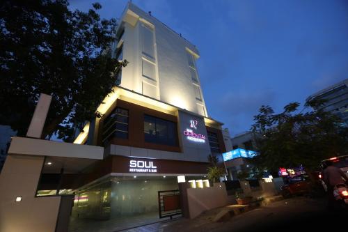 a building with a sign on the side of it at The Oriental Residency in Mumbai