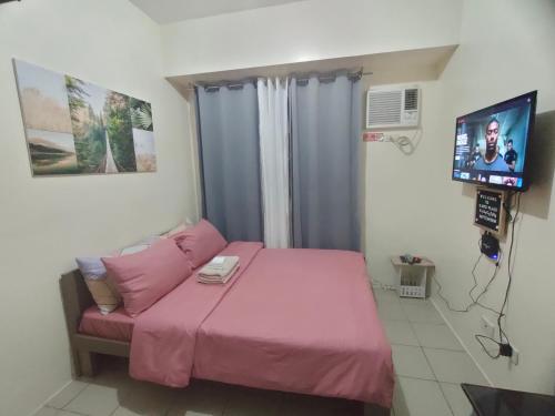 Gaby's Condotel tesisinde bir odada yatak veya yataklar