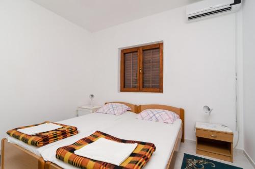 Voodi või voodid majutusasutuse Guesthouse Sobra toas