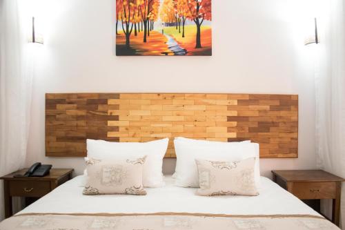 Ένα ή περισσότερα κρεβάτια σε δωμάτιο στο The Smith Hotel