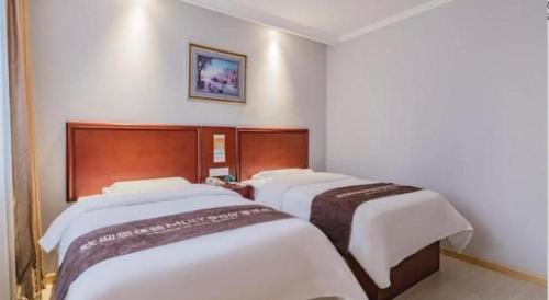 Letto o letti in una camera di GreenTree Inn Beijing Tonzhou Maju Bridge No.2 Express Hotel