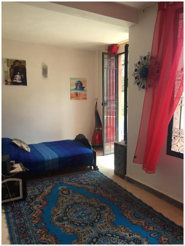 Ein Bett oder Betten in einem Zimmer der Unterkunft Chez Yahia, Au coeur de L'Ourika