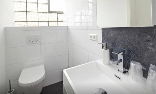 Ванна кімната в Neckarbett - Self Service Hotel