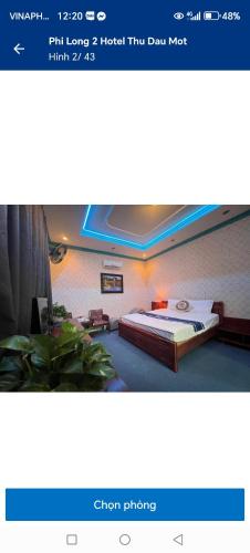 a picture of a bedroom with a bed in a room at Khách sạn phi long 2 in Ấp Phú Thọ