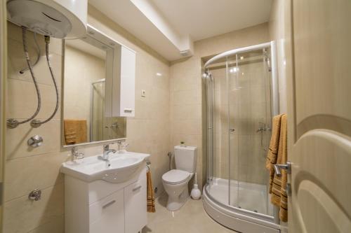 Koupelna v ubytování Milara Apartments